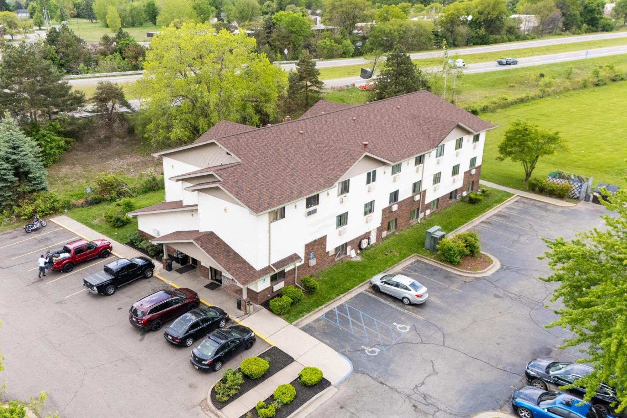 Super Inn By Oyo Lansing Mi Экстерьер фото